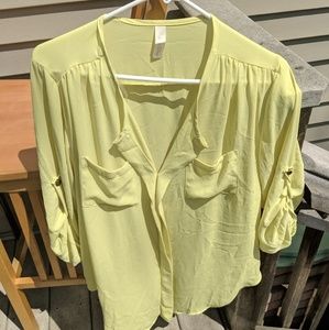 Vibrant yellow shirt, great for fun or work!